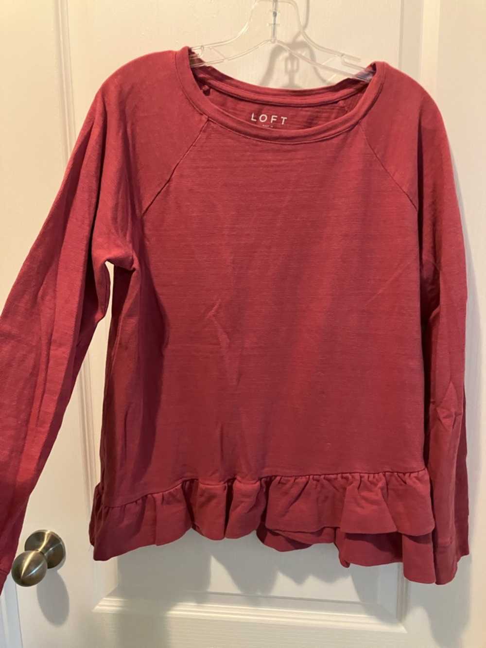 LOFT Ruffled Hem Long Sleeve Sweatshirt in Rose